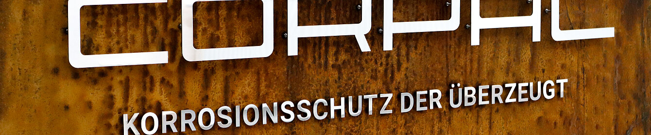 Image with Corpac logo rusted