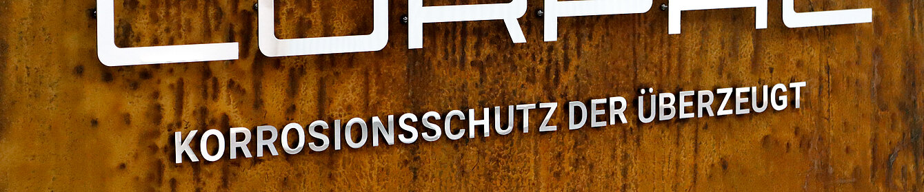 Rostbild mit Corpac Logo und Spruch